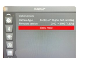 Screenshot of a TruSense camera details panel showing type 'TruSense Digital Self-Leveling', firmware 2092→2100, and a red 'Show more' button, with a left vertical icon bar.